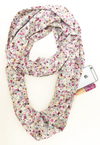 Travel Scarf featuring hidden pocket in ditzy green floral print
